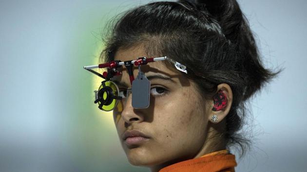 In this photo provided by the OIS/IOC, Manu Bhaker of India competes in the shooting 10m air pistol mixed international team quarter-final , during the Youth Olympic Games in Buenos Aires, Argentina.(AP)