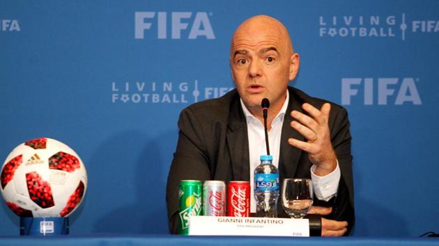 FIFA president Gianni Infantino speaks during a news conference in Doha.(REUTERS)