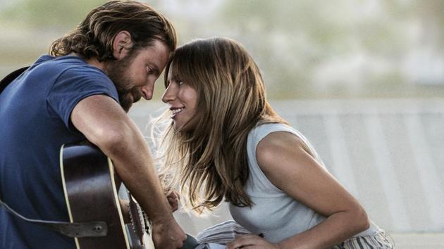 This image released by Warner Bros. Pictures shows Bradley Cooper, left, and Lady Gaga in a scene from A Star is Born. The cast was nominated for a SAG Award for best ensemble.(AP)