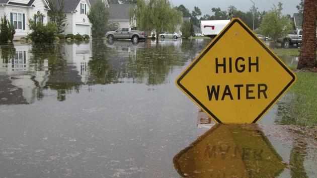 Sign warns of high water. Image for representation.(Getty Images/iStockphoto)