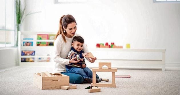 A mother is playing with her son in their home on Mother's day. They little boy is playing with wood blocks. [Picture used for representational images only](Getty Images)