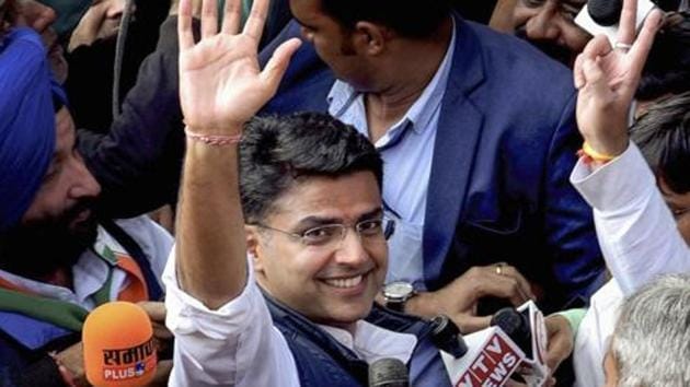 Assembly elections 2018: Rajasthan Pradesh Congress Committee President Sachin Pilot waves at the crowd while going to attend the Congress Legislature Party meeting at the party office in Jaipur.(PTI)