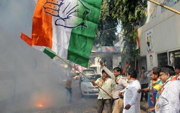 Congress party workers celebrate after the party leading in state assembly election of Rajasthan, MP, Chhattisgarh. (HT File Photo)