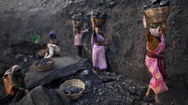 Thirteen miners were feared dead after an illegal coal mine they were digging collapsed on them in Meghalaya’s coal-rich East Jaintia Hills, an area where illegal mining is rife and a National Green Tribunal ban on such activities has been in place for four years.(Representative Image/AP File Photo) Thirteen miners were feared dead after an illegal coal mine they were digging collapsed on them in Meghalaya’s coal-rich East Jaintia Hills, an area where illegal mining is rife and a National Green Tribunal ban on such activities has been in place for four years.(Representative Image/AP File Photo)