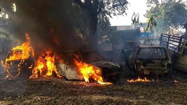 Vehicles set on fire by a mob during a protest over the alleged illegal slaughter of cattle, in Bulandshahr.(PTI file photo)