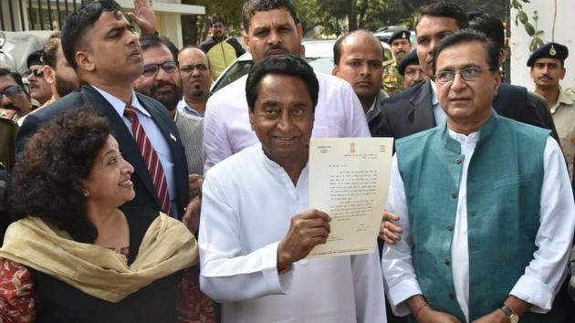 Senior Congress leader Kamal Nath shows Madhya Pradesh Governor Anandiben Patel’s letter inviting him to form the government in the state, outside Raj Bhawan in Bhopal. Kamal Nath will lead the Congress government in Madhya Pradesh where it returned to power after 15 years, the party announced after a meeting of its legislators in Bhopal. Senior Congress leader Kamal Nath shows Madhya Pradesh Governor Anandiben Patel’s letter inviting him to form the government in the state, outside Raj Bhawan in Bhopal. Kamal Nath will lead the Congress government in Madhya Pradesh where it returned to power after 15 years, the party announced after a meeting of its legislators in Bhopal.