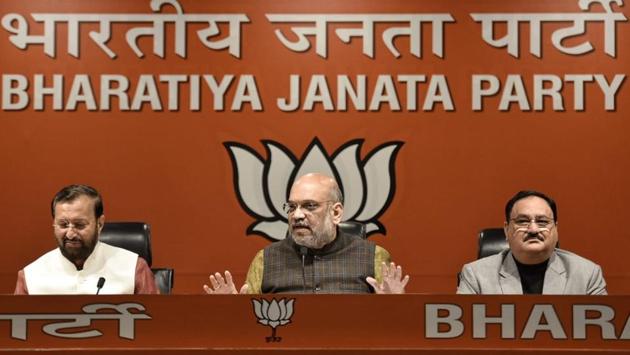 BJP President Amit Shah addresses a press conference at the party’s headquarters in New Delhi. “Rahul Gandhi should apologise that he tried to create suspicions in the mind of the soldiers and people... He has attempted to jeopardise the nation’s security,” Shah said, launching into a stinging attack on Gandhi and the Congress after the Supreme Court’s clean chit to the government on the Rafale aircraft deal. (Sanchit Khanna / HT Photo) BJP President Amit Shah addresses a press conference at the party’s headquarters in New Delhi. “Rahul Gandhi should apologise that he tried to create suspicions in the mind of the soldiers and people... He has attempted to jeopardise the nation’s security,” Shah said, launching into a stinging attack on Gandhi and the Congress after the Supreme Court’s clean chit to the government on the Rafale aircraft deal. (Sanchit Khanna / HT Photo)