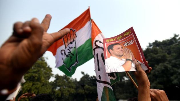 Congress supporters celebrate as the party shows counting day leads in three state assembly elections at AICC in New Delhi. (Amal KS / HT Photo) Congress supporters celebrate as the party shows counting day leads in three state assembly elections at AICC in New Delhi. (Amal KS / HT Photo)