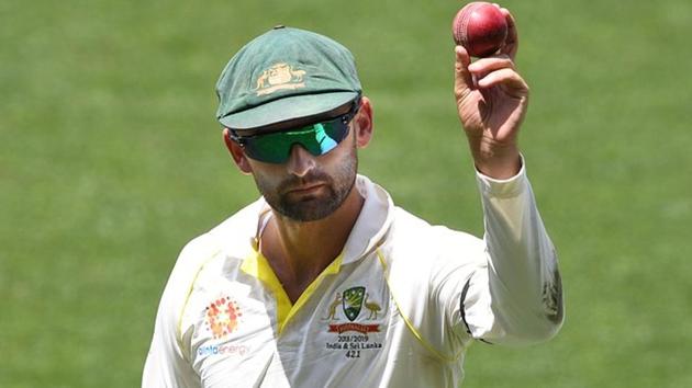 Nathan Lyon shows the ball as he leaves the field following his 6 wicket haul on day four of the first Test match. (REUTERS) Nathan Lyon shows the ball as he leaves the field following his 6 wicket haul on day four of the first Test match. (REUTERS)