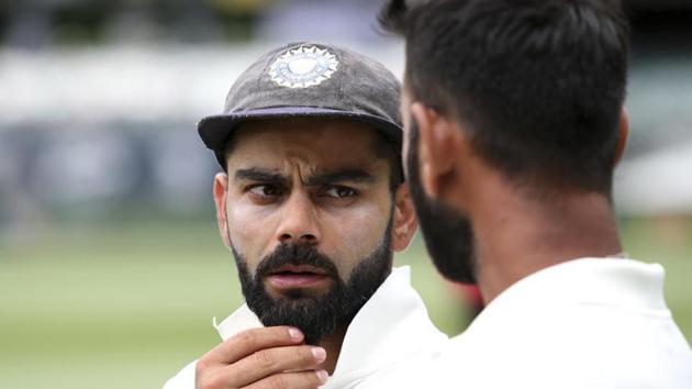 Cheteshwar Pujara, right, talks with his captain Virat Kohli.(AP) Cheteshwar Pujara, right, talks with his captain Virat Kohli.(AP)