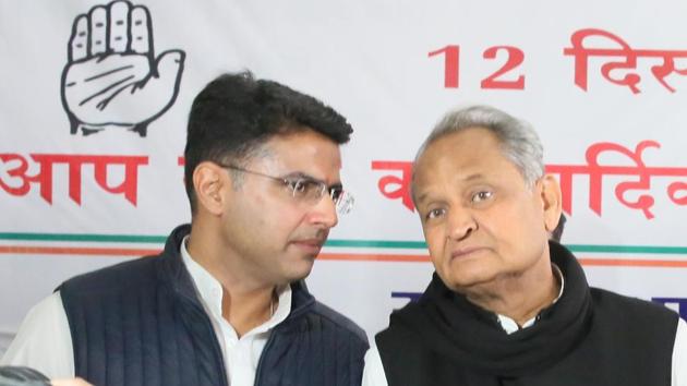 Rajasthan state Congress chief Sachin Pilot and former chief minister Ashok Gehlot in conversation during the Congress legislature meeting, at party office, in Jaipur, Rajasthan, Wednesday, December 12, 2018.(Himanshu Yvas / HT Photo)