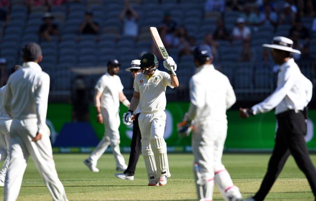 Australia's batsman Travis Head (C) celebrates after scoring a half-century (50 runs) during day one of the second Test cricket match between Australia and India in Perth. (AFP) Australia's batsman Travis Head (C) celebrates after scoring a half-century (50 runs) during day one of the second Test cricket match between Australia and India in Perth. (AFP)