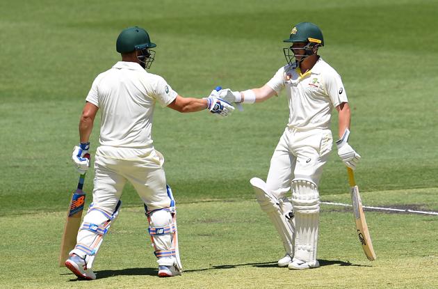 Australia's batsmen Marcus Harris (R) and Aaron Finch greet each other after their 100 runs partnership during day one of the second Test cricket match between Australia and India in Perth. (AFP) Australia's batsmen Marcus Harris (R) and Aaron Finch greet each other after their 100 runs partnership during day one of the second Test cricket match between Australia and India in Perth. (AFP)