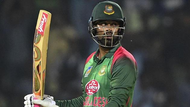 Tamim Iqbal reacts after scoring a half century during the third one-day international (ODI) between Bangladesh and West Indies.(AFP)