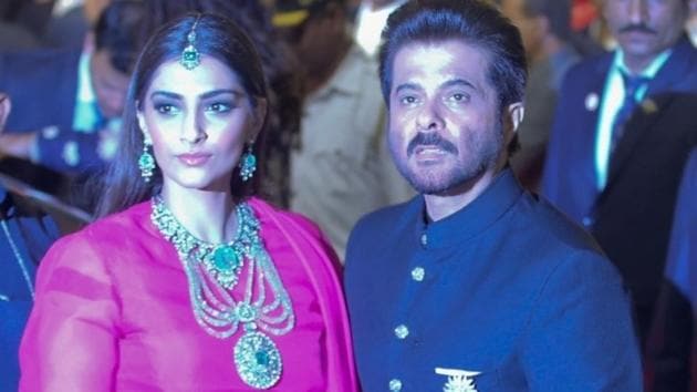 Actor Anil Kapoor with his daughter Sonam Kapoor at the wedding ceremony of industrialist Mukesh Ambani's daughter Isha Ambani and Anand Piramal at Antilia in Mumbai.(IANS)