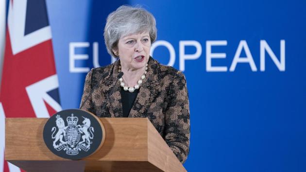 Theresa May, UK prime minister, speaks during a news conference at a European Union (EU) leaders summit in Brussels, Belgium, on December 14.(Bloomberg)