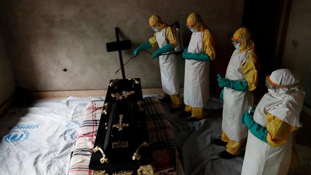 A healthcare worker sprays a room during a funeral of Kavugho Cindi Dorcas who is suspected of dying of Ebola in Beni, North Kivu Province of Democratic Republic of Congo. (Goran Tomasevic / REUTERS) A healthcare worker sprays a room during a funeral of Kavugho Cindi Dorcas who is suspected of dying of Ebola in Beni, North Kivu Province of Democratic Republic of Congo. (Goran Tomasevic / REUTERS)