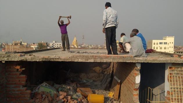 Muzaffarpur , India - Dec. 13, 2018: Laborers demolishing top floor of Muzaffarpur shelter home after sexual abuse case in Muzaffarpur District in Bihar , India, on Thursday, December 13, 2018. (Hindustan Times Photo) (HT Photo) Muzaffarpur , India - Dec. 13, 2018: Laborers demolishing top floor of Muzaffarpur shelter home after sexual abuse case in Muzaffarpur District in Bihar , India, on Thursday, December 13, 2018. (Hindustan Times Photo) (HT Photo)