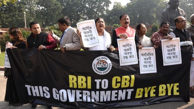 Trinamool Congress MPs raise slogans and display placards while staging a protest against the Union government and its ‘misuse’ of central institutions like the RBI and CBI, during the Winter Session of Parliament, in New Delhi. (Arvind Yadav / HT Photo) Trinamool Congress MPs raise slogans and display placards while staging a protest against the Union government and its ‘misuse’ of central institutions like the RBI and CBI, during the Winter Session of Parliament, in New Delhi. (Arvind Yadav / HT Photo)