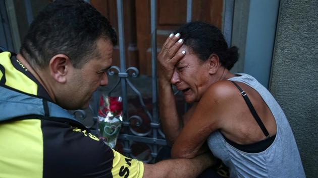 People react after a shooting at Catholic cathedral in Campinas, Brazil. (Amanda Perobelli / REUTERS) People react after a shooting at Catholic cathedral in Campinas, Brazil. (Amanda Perobelli / REUTERS)