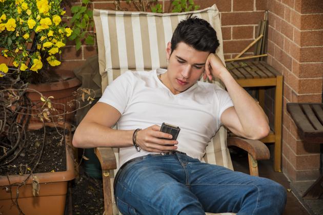 Constant use of portable electronic devices is the leading cause of Text Neck and this postural deviation is being noticed in teenagers and young adults(Shutterstock)