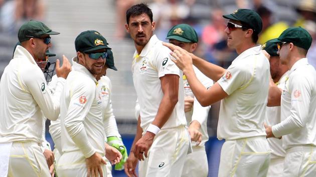 Australia's Mitchell Starc (C) celebrates with teammates the dismissal of India's batsman Murali Vijay. (AFP) Australia's Mitchell Starc (C) celebrates with teammates the dismissal of India's batsman Murali Vijay. (AFP)