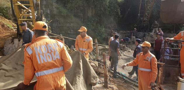 Rescuers work at the site of a coal mine that collapsed in Ksan, in the northeastern Indian state of Meghalaya, Friday, Dec. 14, 2018. Thirteen young miners were missing and feared dead following the collapse of a shaft and flooding of a coal mine they were digging illegally in India's remote northeast, police said Friday.(AP)