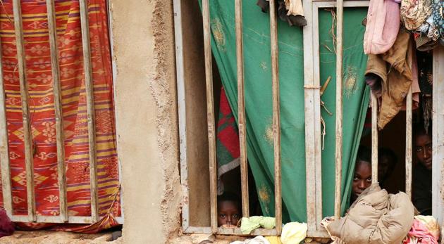People look through window bars in their shelter within a camp for internally displaced people in Chelelektu, a town in the Southern Nations, Nationalities, and Peoples' Region in Ethiopia on August 15. (REUTERS File) People look through window bars in their shelter within a camp for internally displaced people in Chelelektu, a town in the Southern Nations, Nationalities, and Peoples' Region in Ethiopia on August 15. (REUTERS File)