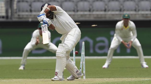 India's Murali Vijay is bowled by Australia's Mitchell Starc. (AP) India's Murali Vijay is bowled by Australia's Mitchell Starc. (AP)
