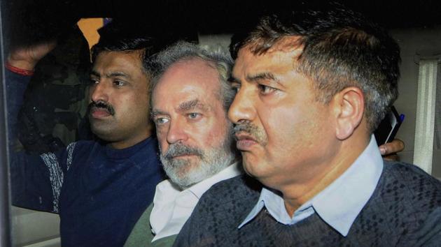 Christian Michel (C), the alleged middleman in the multi-crore AgustaWestland chopper deal, being produced at a CBI court in Patiala House Court in New Delhi on Dec 15. (PTI Photo) Christian Michel (C), the alleged middleman in the multi-crore AgustaWestland chopper deal, being produced at a CBI court in Patiala House Court in New Delhi on Dec 15. (PTI Photo)