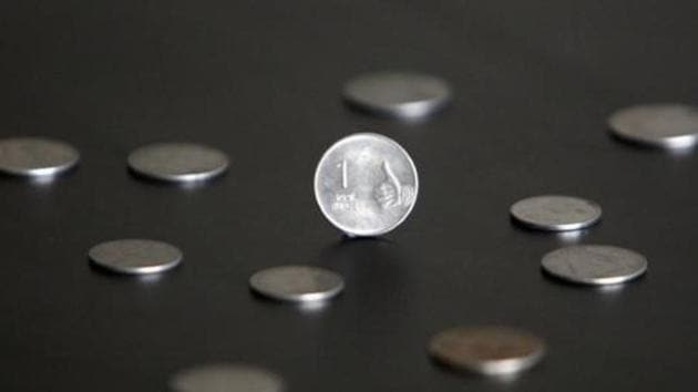 A one rupee coin is seen in this picture illustration taken in Mumbai.(Reuters)