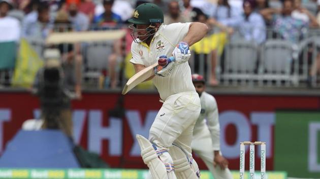 Australia's Aaron Finch is hit on the hand by a ball from India's Mohammed Shami forcing him to retire hurt during play in the second cricket test between Australia and India (AP)