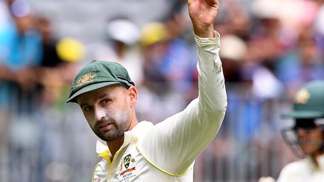 Australia's Nathan Lyon shows the ball after taking 5 wickets, on day three of the second test match between Australia and India at Perth Stadium in Perth, Australia (REUTERS)