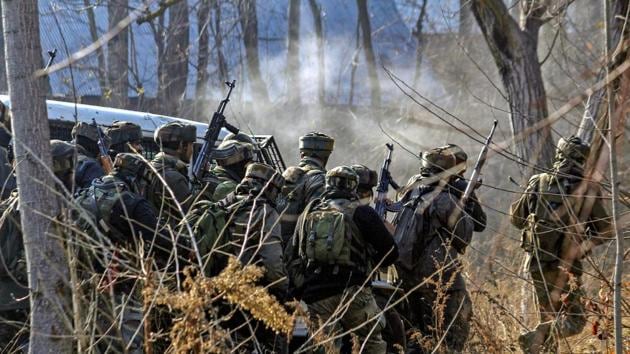 Army soldiers during an encounter with militants in Pulwama district on Saturday. (PTI) Army soldiers during an encounter with militants in Pulwama district on Saturday. (PTI)