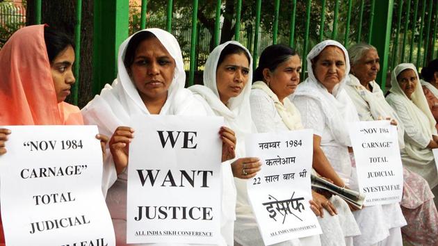 ( In this file photo taken on October 31, 2006 relatives of Indian Sikhs killed in the 1984 riot hold placards during a protest demanding justice in New Delhi. - An Indian court on November 20, 2018 handed down first death penalty over deadly 1984 anti-Sikh riots. (AFP) ( In this file photo taken on October 31, 2006 relatives of Indian Sikhs killed in the 1984 riot hold placards during a protest demanding justice in New Delhi. - An Indian court on November 20, 2018 handed down first death penalty over deadly 1984 anti-Sikh riots. (AFP)