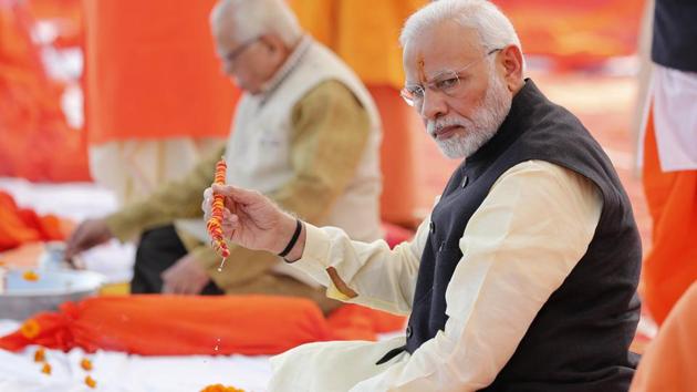 Prime Minister Narendra Modi performs rituals at Sangam. (AP) Prime Minister Narendra Modi performs rituals at Sangam. (AP)