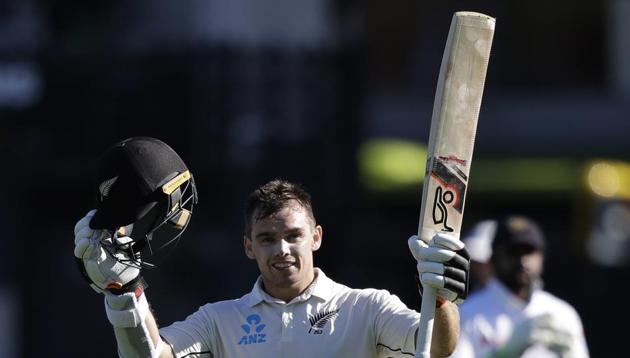 New Zealand's Tom Latham celebrates after scoring a century during play on day two of the first cricket test between New Zealand and Sri Lanka in Wellington, New Zealand, Sunday, Dec. 16, 2018 (AP) New Zealand's Tom Latham celebrates after scoring a century during play on day two of the first cricket test between New Zealand and Sri Lanka in Wellington, New Zealand, Sunday, Dec. 16, 2018 (AP)