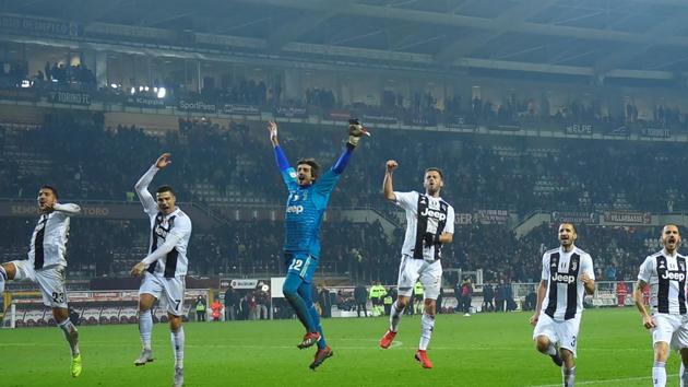 Juventus' Cristiano Ronaldo celebrates after the match with team mates.(REUTERS)