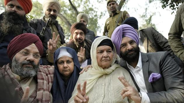 Family members of victims killed in the 1984 anti-Sikh riots after a judgement by the Delhi High Court sentenced Congress leader Sajjan Kumar to life imprisonment in one of the cases, reversing a trial court acquittal. The court also directed Kumar to surrender by December 31, 2018, and slapped a fine of Rs 5 lakh on him and Rs 1 lakh on all other accused in the case. (Sanchit Khanna / HT Photo) Family members of victims killed in the 1984 anti-Sikh riots after a judgement by the Delhi High Court sentenced Congress leader Sajjan Kumar to life imprisonment in one of the cases, reversing a trial court acquittal. The court also directed Kumar to surrender by December 31, 2018, and slapped a fine of Rs 5 lakh on him and Rs 1 lakh on all other accused in the case. (Sanchit Khanna / HT Photo)