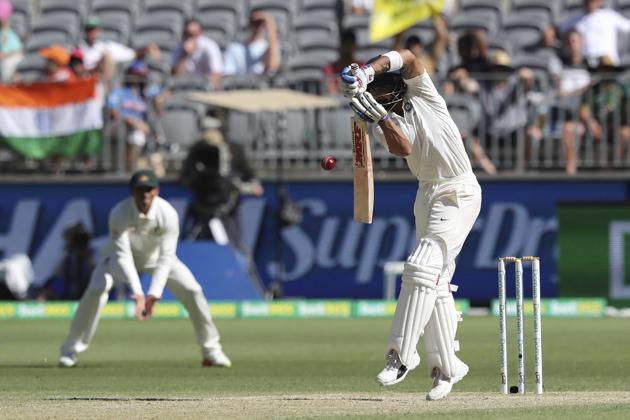 India's Virat Kohli plays a defensive shot during play. (AP)