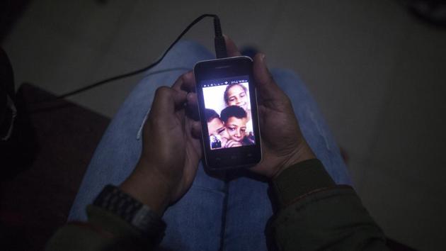 Through the fuzzy, at times pixilated connection, Espinoza gets glimmers of hope that the separation will not cast a permanent scar on her children. After the initial call in which Elvis did not recognize his mother, Espinoza’s brother began showing the young boy pictures of her. Now when she calls, Elvis recognizes her. (Ivan Valencia / AP) Through the fuzzy, at times pixilated connection, Espinoza gets glimmers of hope that the separation will not cast a permanent scar on her children. After the initial call in which Elvis did not recognize his mother, Espinoza’s brother began showing the young boy pictures of her. Now when she calls, Elvis recognizes her. (Ivan Valencia / AP)