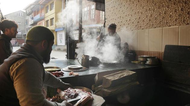 Aijaz Bhat, a popular Harissa maker, is not happy about Harissa’s growing publicity because more customers mean they can’t cater to the rush. “It doesn’t feel good that people wake up early to drive to our shop and return empty-handed,” he says. “We can’t increase production simply by hiring more assistants. Unless we do all of it ourselves, I don’t feel it’s the real thing,” Aijaz adds. (Waseem Andrabi / HT Photo) 