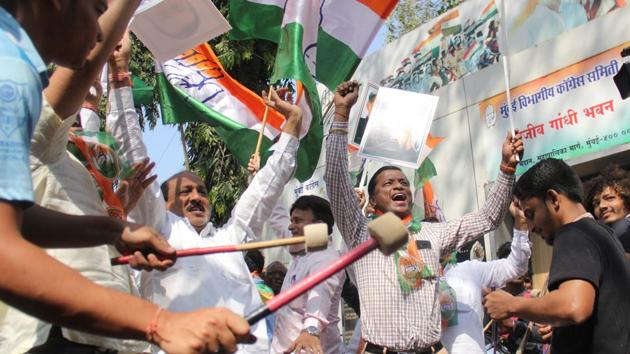 Congress workers celebrate after results of the assembly elections in Rajasthan, Madhya Pradesh and Chhattisgarh at the party office in Mumbai on December 11. (Bhushan Koyande/HT)