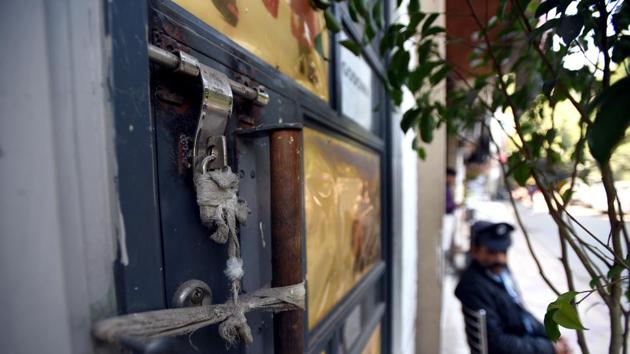 A sealed door seen after a sealing drive at Defence colony market, in New Delhi,(Amal KS/HT PHOTO)
