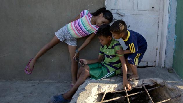 Like thousands in what the UN calls the largest exodus in South America’s modern history, Espinoza made an agonizing choice six months ago: To leave without her three children. She did not have the money to bring them and had no idea what trials she might face in Colombia. So she left them with her brother, hoping to earn enough to feed them and, with time, reunite. (Fernando Llano / AP) Like thousands in what the UN calls the largest exodus in South America’s modern history, Espinoza made an agonizing choice six months ago: To leave without her three children. She did not have the money to bring them and had no idea what trials she might face in Colombia. So she left them with her brother, hoping to earn enough to feed them and, with time, reunite. (Fernando Llano / AP)