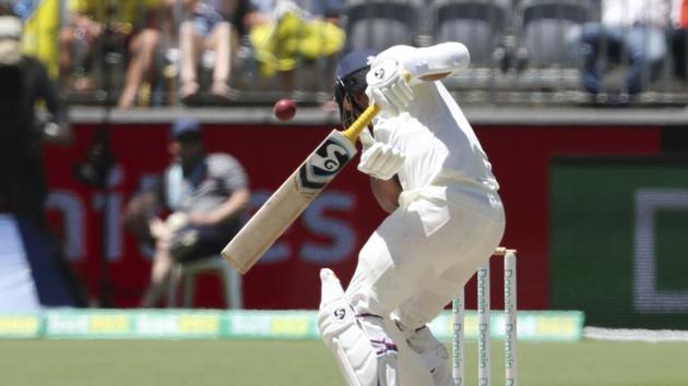India's Umesh Yadav is hit by a ball from Australia's Mitchell Starc during play in the second cricket test between Australia and India in Perth. (AP)