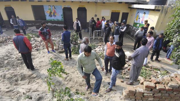 A team of NDRF during rescue work at the school in Noida’s Salarpur village after the boundary wall of the school collapsed, December 17, 2018. (Sunil Ghosh / HT Photo) A team of NDRF during rescue work at the school in Noida’s Salarpur village after the boundary wall of the school collapsed, December 17, 2018. (Sunil Ghosh / HT Photo)