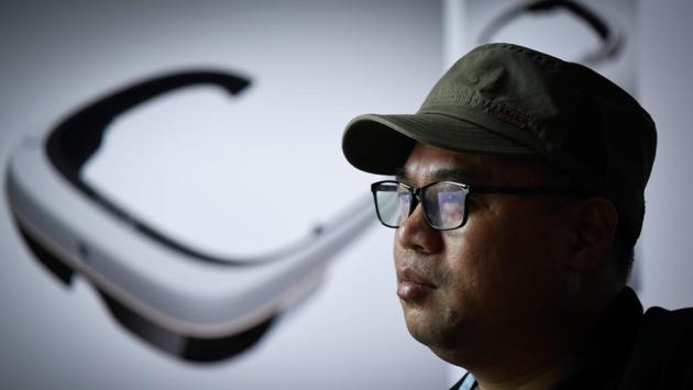 The son of poor farmers, Wu arrived here in 2005 and over the years assembled devices similar to Apple’s iPad or MacBook, joining Shenzhen’s army making “shanzhai” -- affordable knock-offs of foreign electronics for the local population. “Germany, the United States, Japan, South Korea... All developed countries have done this to develop their manufacturing industry,” Wu said. “You have to do that to gain experience.” (Wang Zhao / AFP) The son of poor farmers, Wu arrived here in 2005 and over the years assembled devices similar to Apple’s iPad or MacBook, joining Shenzhen’s army making “shanzhai” -- affordable knock-offs of foreign electronics for the local population. “Germany, the United States, Japan, South Korea... All developed countries have done this to develop their manufacturing industry,” Wu said. “You have to do that to gain experience.” (Wang Zhao / AFP)