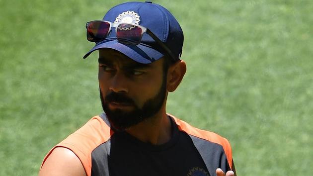 India's captain Virat Kohli claps for his teammates at the end of the second Test cricket match between Australia and India in Perth on December 18, 2018. (AFP) India's captain Virat Kohli claps for his teammates at the end of the second Test cricket match between Australia and India in Perth on December 18, 2018. (AFP)