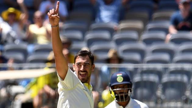 Australia's paceman Mitchell Starc (L) celebrates the dismissal of India's batsman Hanuma Vihari (R) during day five of the second Test cricket match between Australia and India in Perth. (AFP)